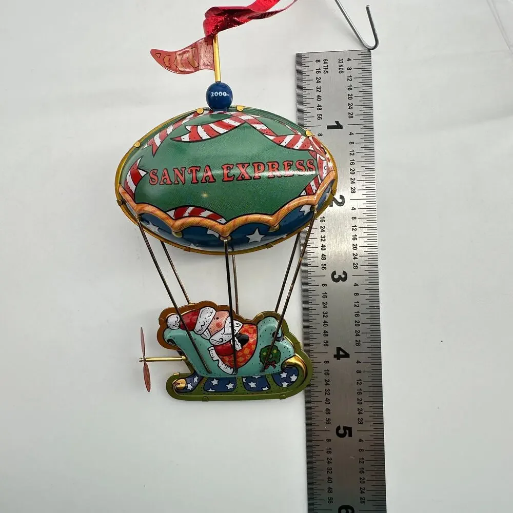 2000 Hallmark Keepsake Merry Ballooning Santa Express Pressed Tin Ornament